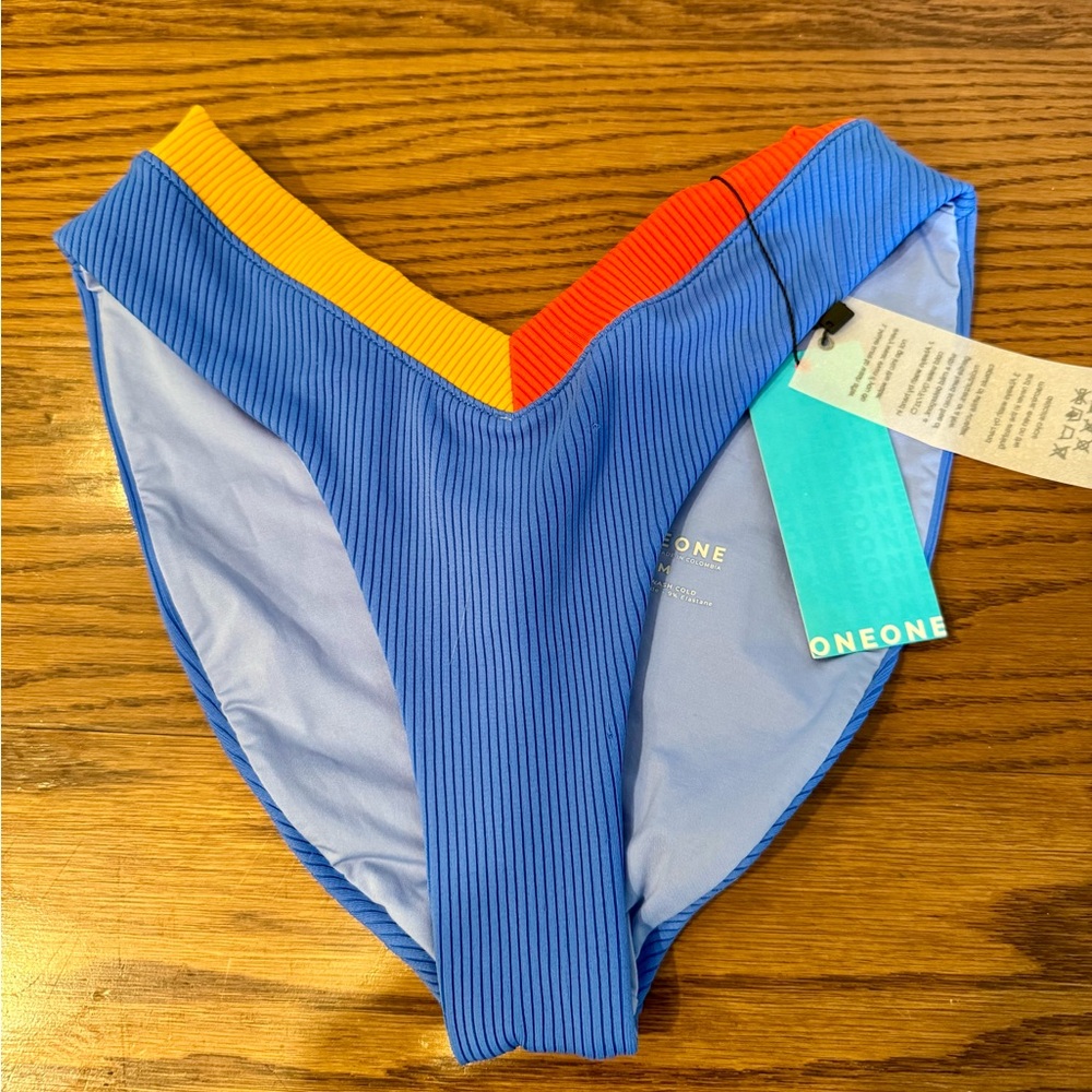 NWT; Medium; ONEONE Blue Bikini Bottom with yellow and orange Accents